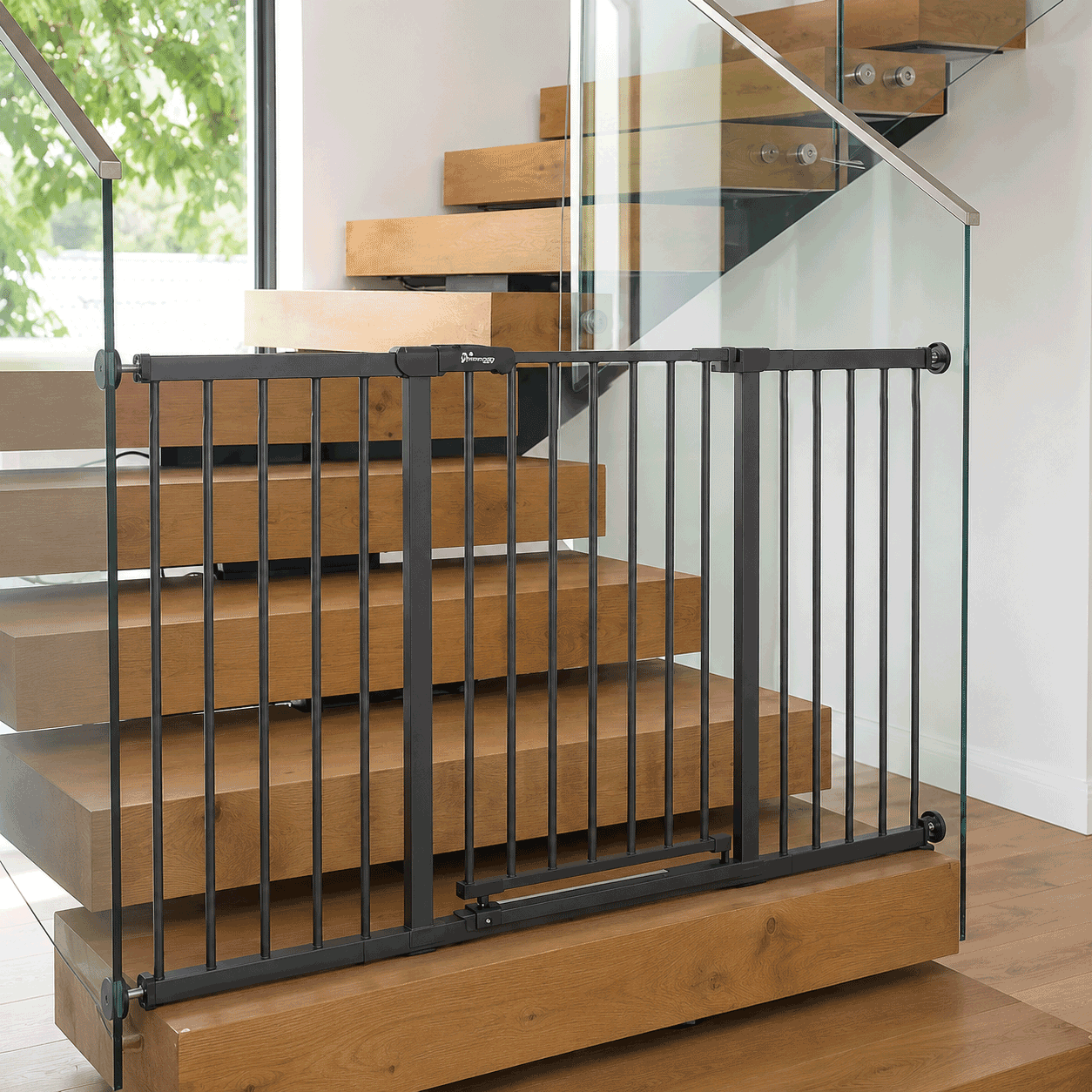 baby-safety-gate-color-charcoal-black-mounted-to-glass