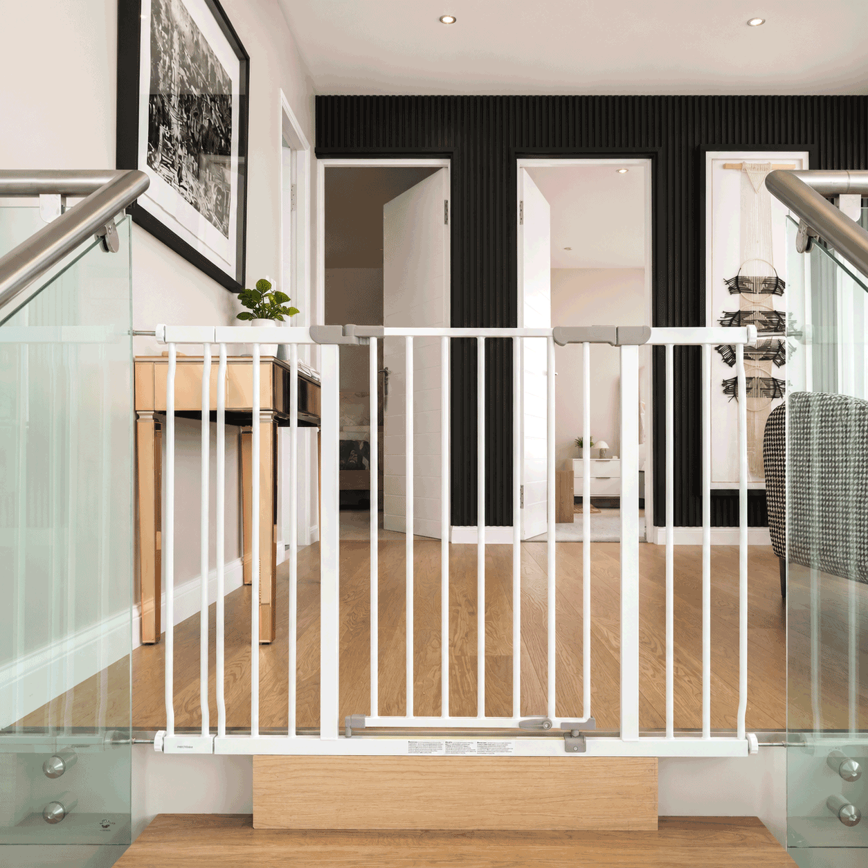 Dreambaby-extra-wide-baby-gate-mounted-to-glass-with-banister-adaptors