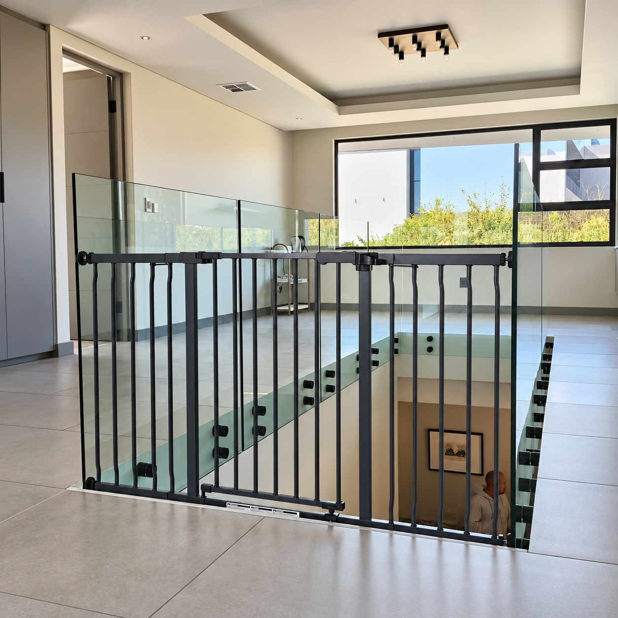 baby-gates-mounted-to-glass-photo-of-installation